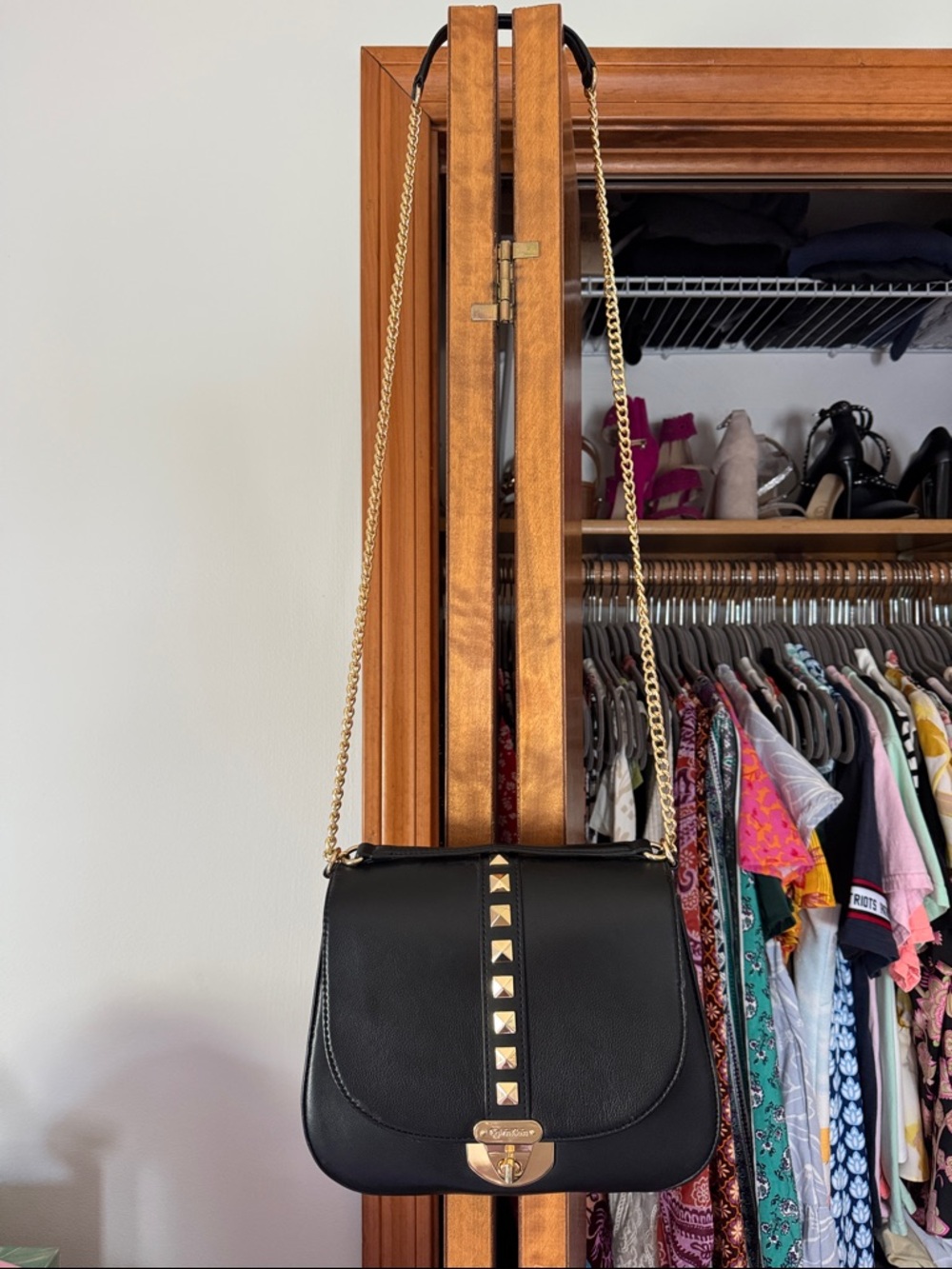 Calvin Klein Black Leather Crossbody Bag with Gold Stud Accents